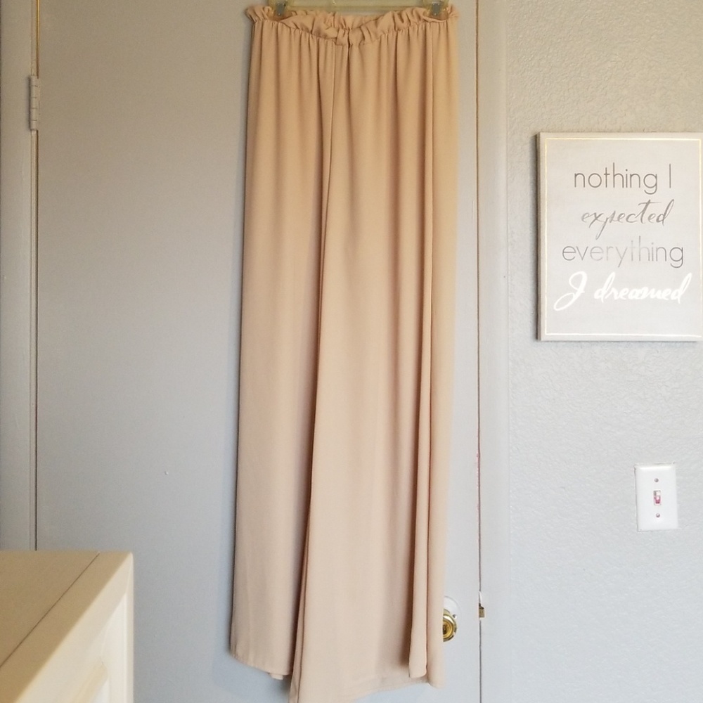 Blush long wide-legged palazzo pants.